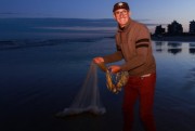 Pescadores animados com a Festa da Tainha em Balne&aacute;rio Rinc&atilde;o
